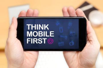 image of mobile phone with Think Mobile First on the screen