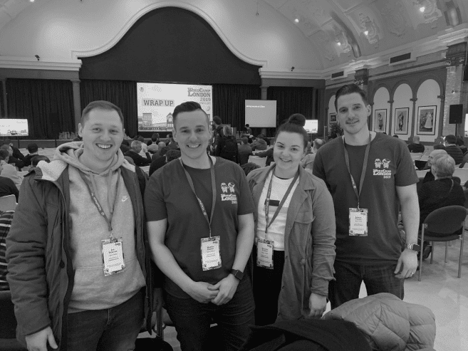 team photo of impacters in black and white