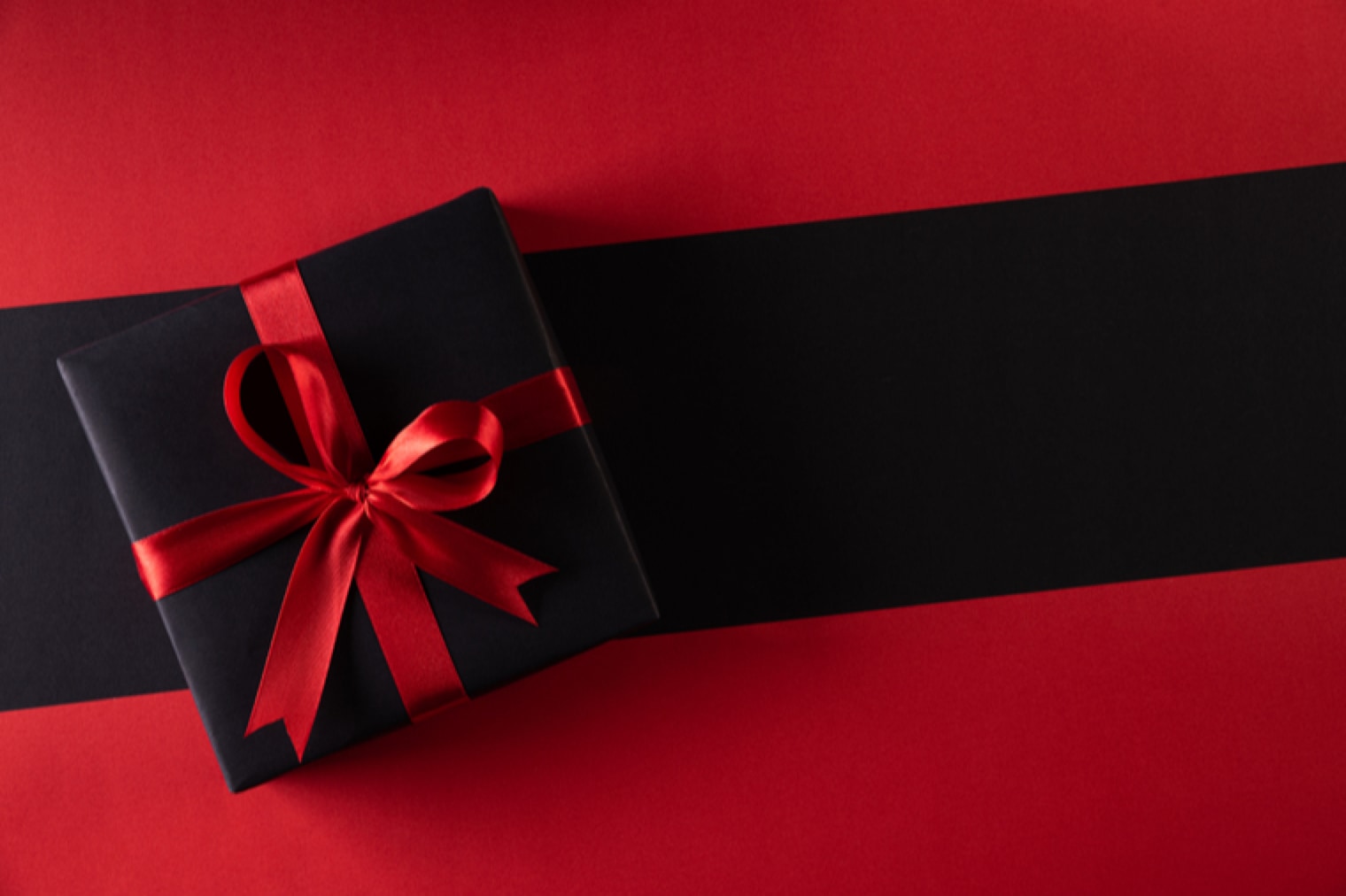 wrapped gift to represent black friday, christmas, and january sales