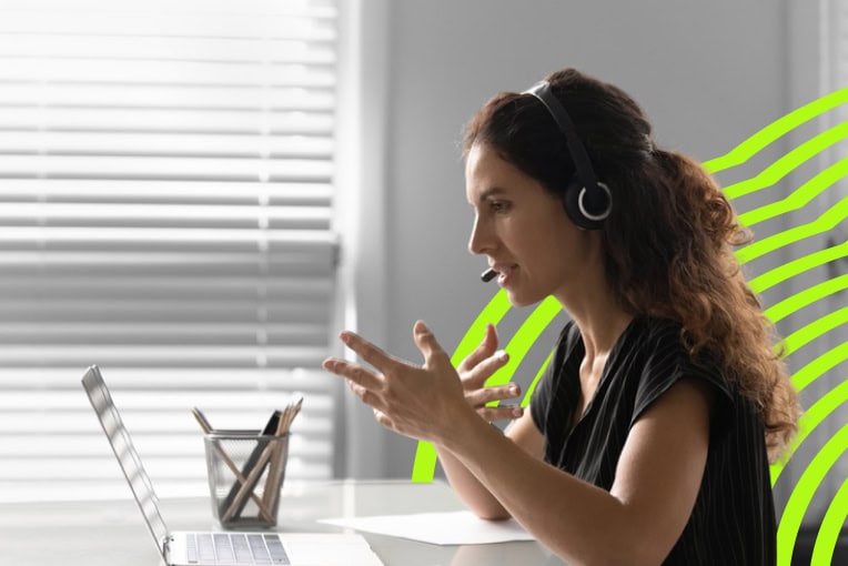 women interviewing someone by video call on a laptop