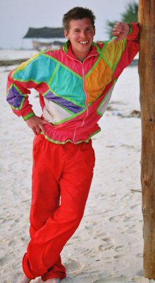 man in a shell suit jacket in a bold print