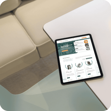 the Farleygreene website on a tablet laying on a table